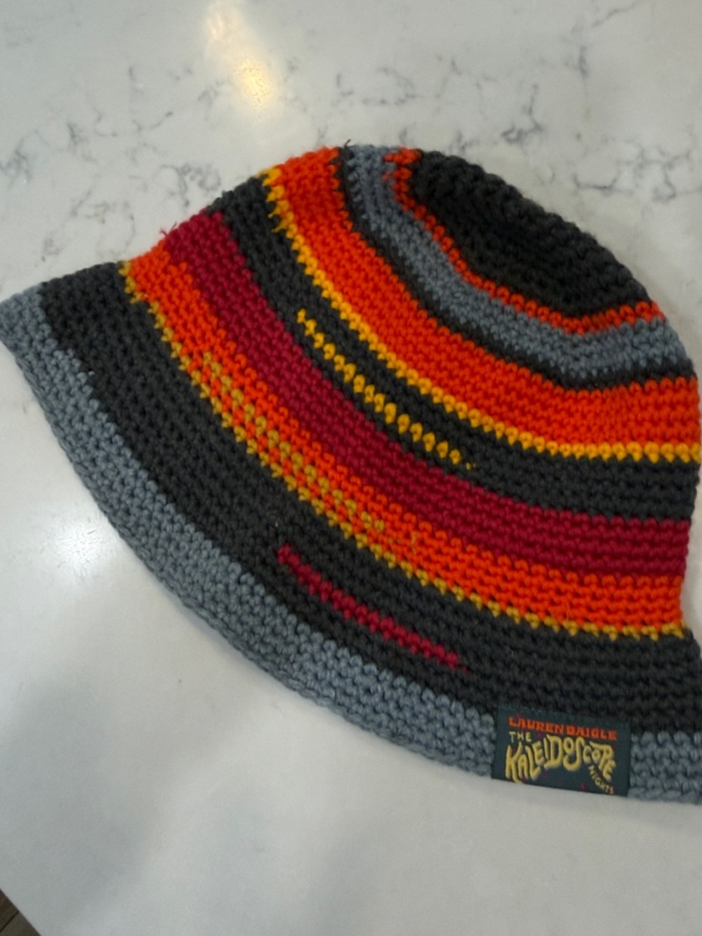 The Kaleidoscope Striped Crochet Bucket Hat from Lauren Daegle Concert!